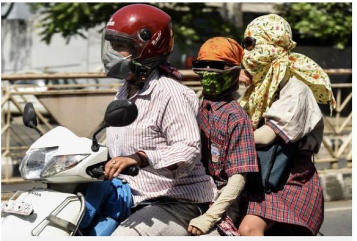 Nắng nóng hầm hập ở miền Bắc và miền Trung còn kéo dài đến khi nào?